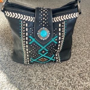 Black geometric hobo bag